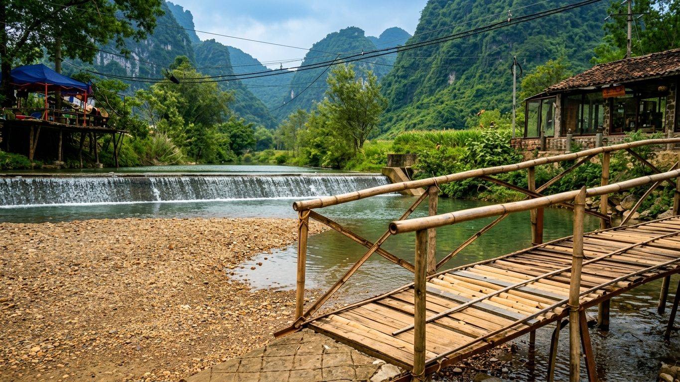 A bamboo footbridge and stone weir on the stream at Khuổi Ky village, Cao Bằng